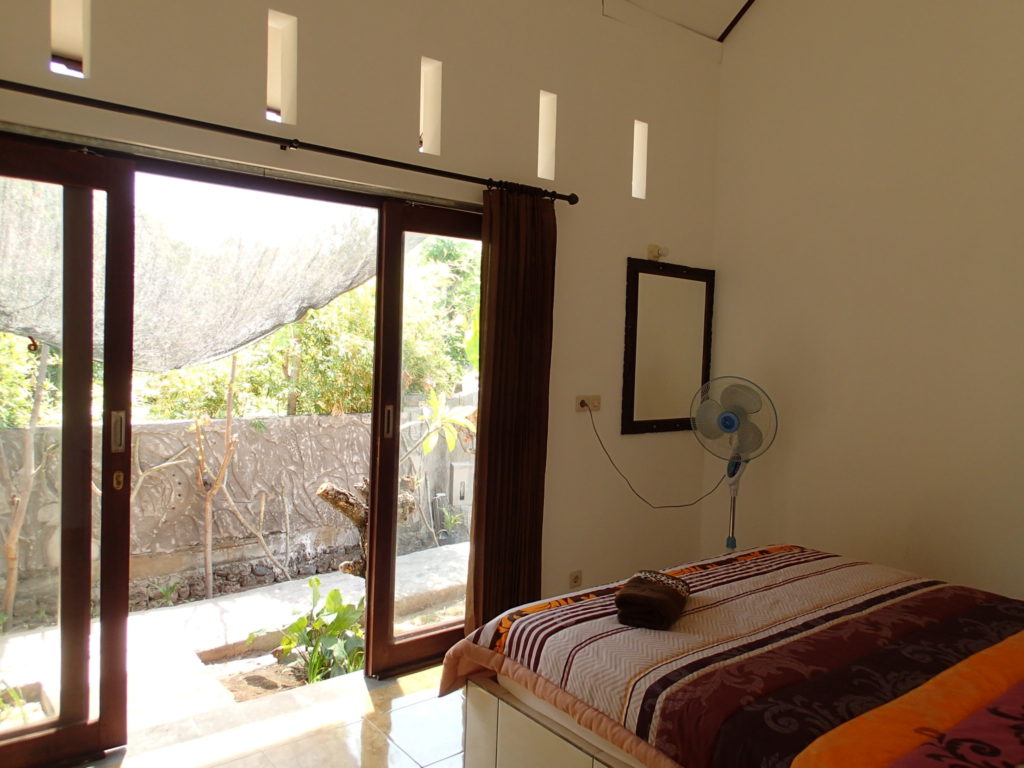 Amed Bali cheap stay room door